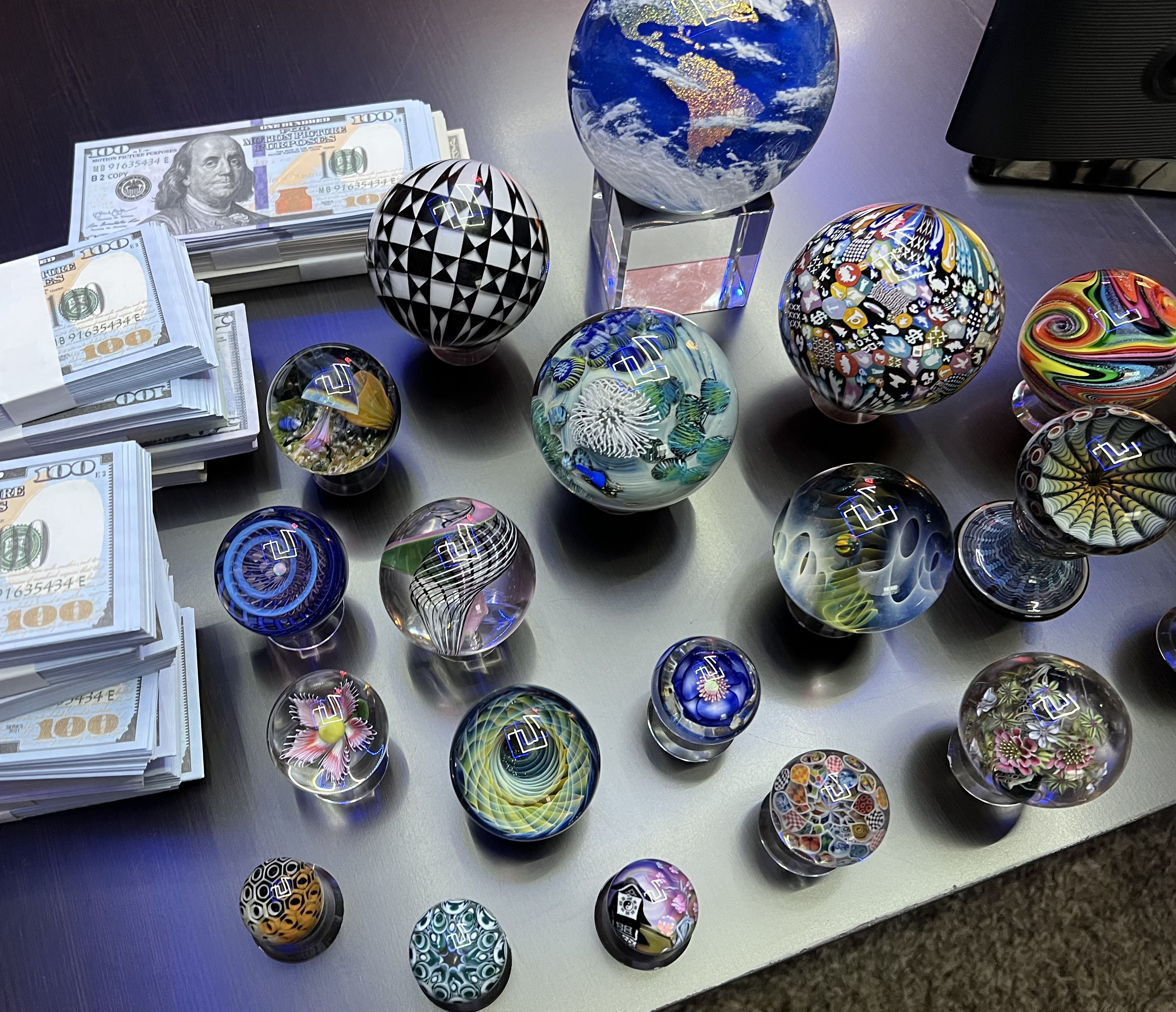 A worktable covered with finished handmade marbles