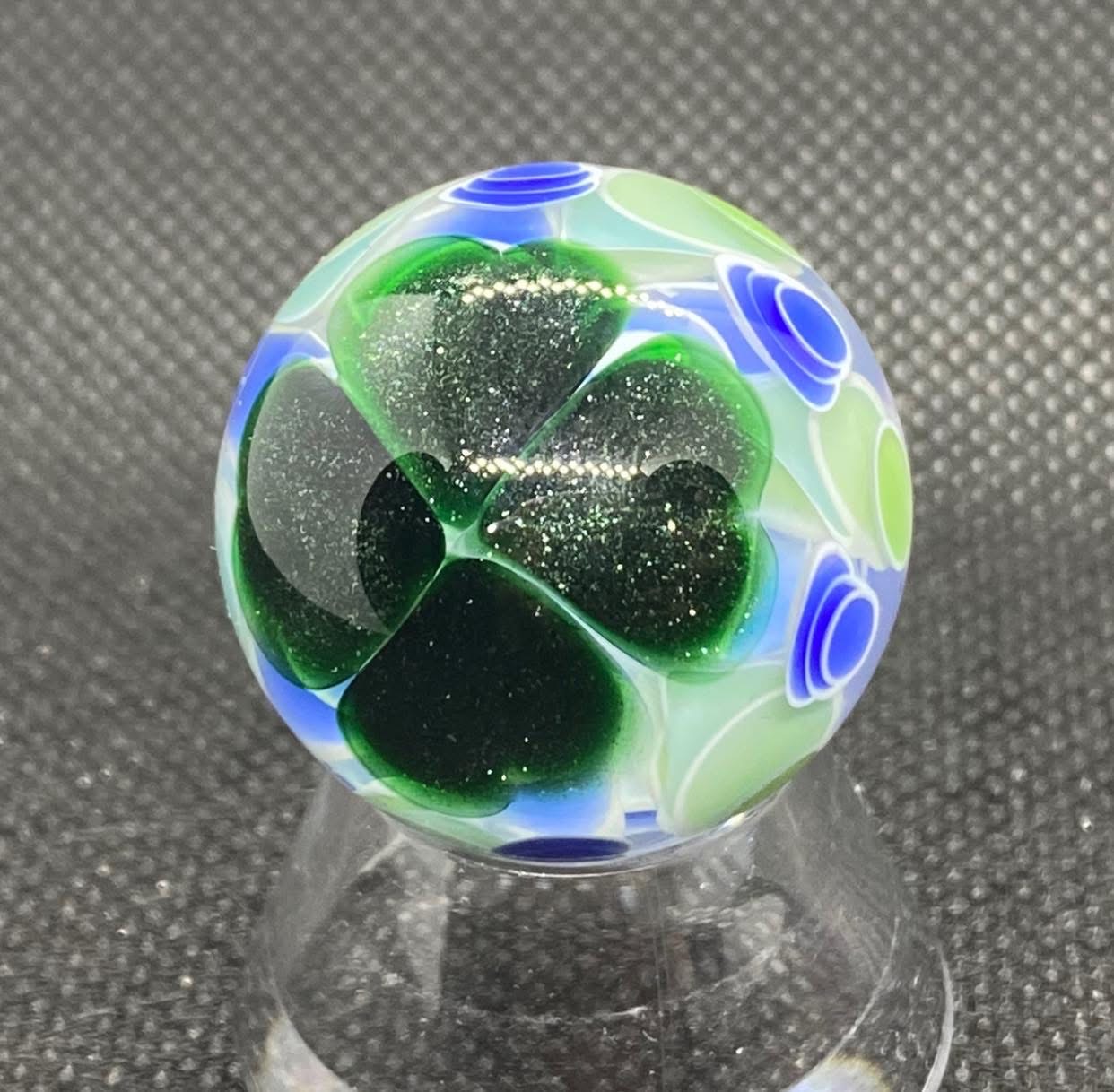 Dot Stack Shamrock Marble: full clover view showing deep green leaves and fine sparkle