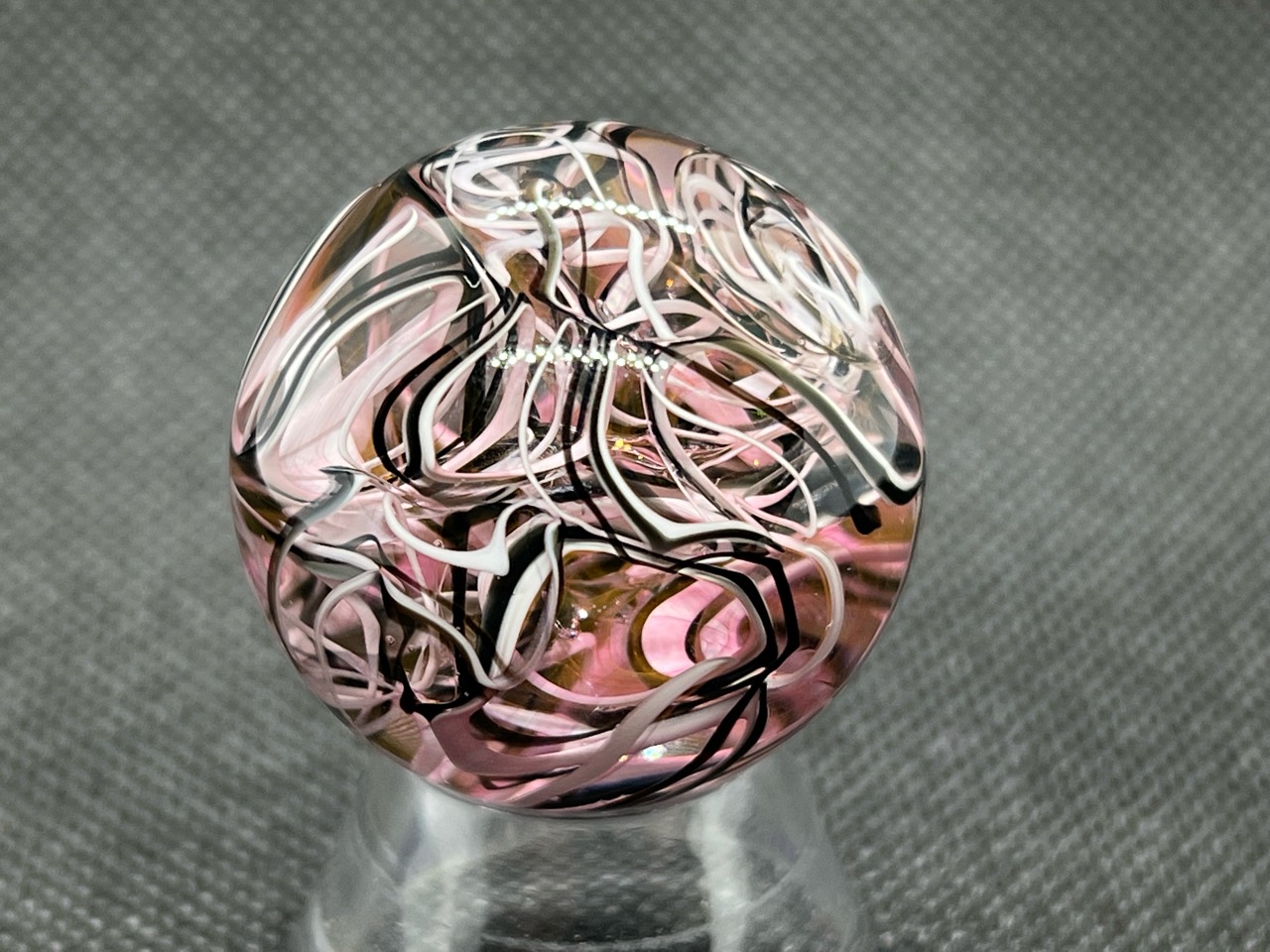 Fine Lines & Gold Fume Marble: Close view of fine white and pink loops, dark ribbons and warm gold fume