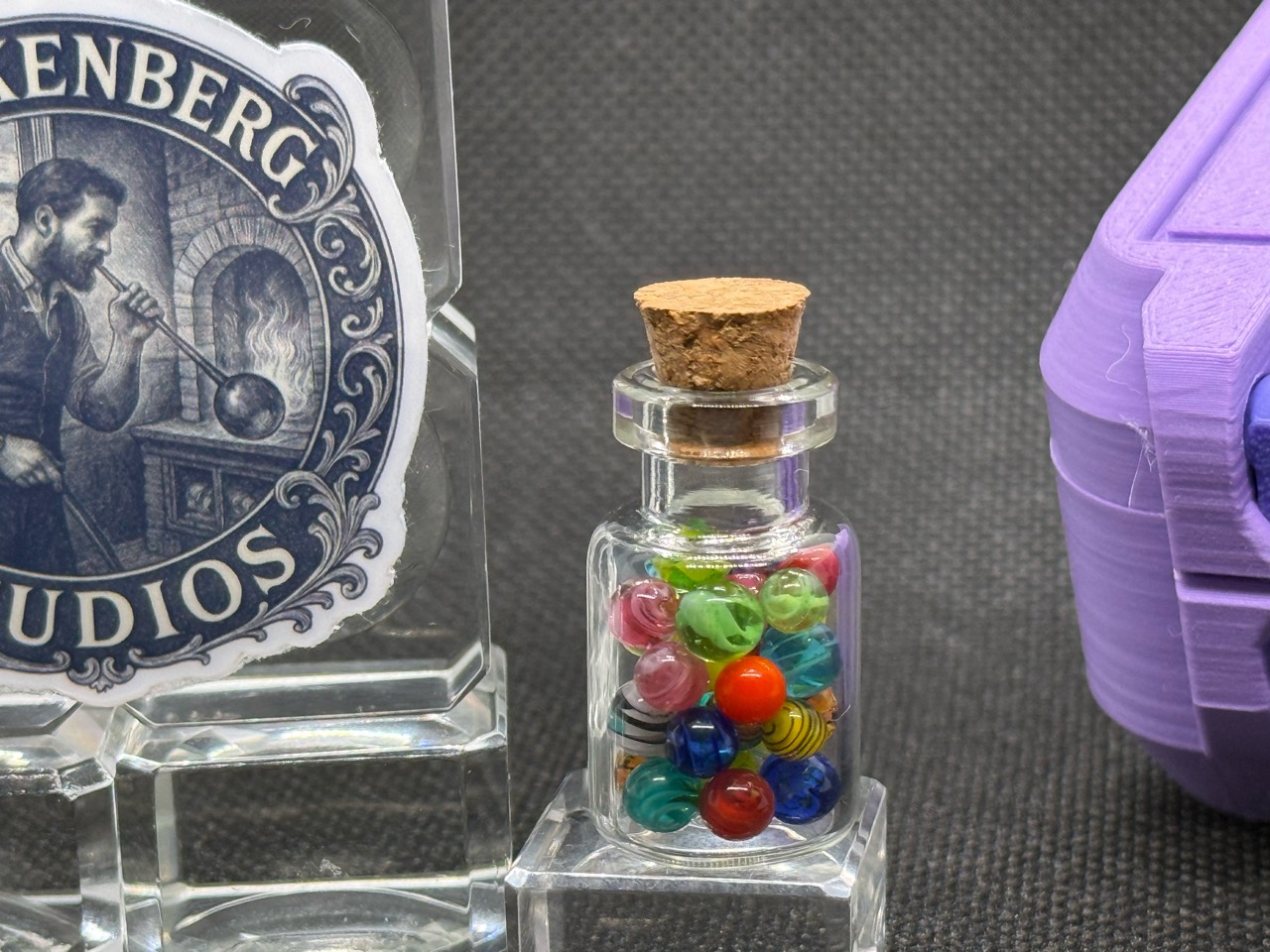 Alternate view of Mixed Colors Mini Micro Marbles in their corked jar