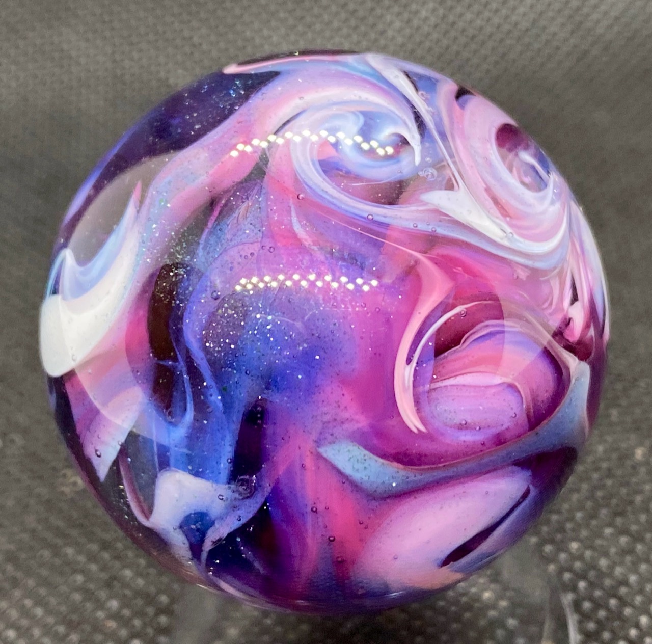 Pink and Purple Cosmos Glitter Ball: pink and purple glass with pale curling ribbons and sparkling flecks