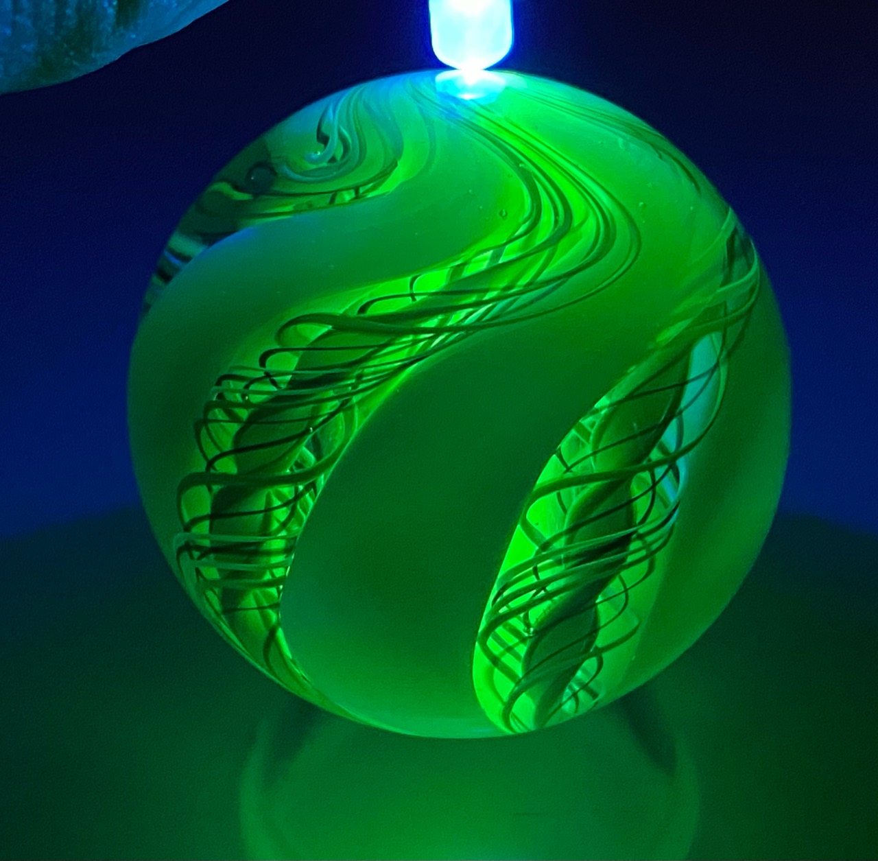 Uranium Glass Twist (2021): finished marble with a uv light source